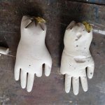 failed hands made of clay