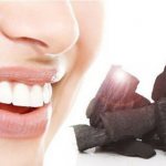 Teeth whitening with activated carbon